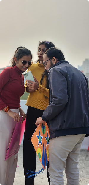 Employees celebrating Makar Sankranti