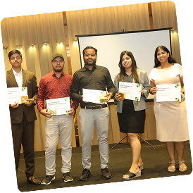 Group photo of award winners on stage